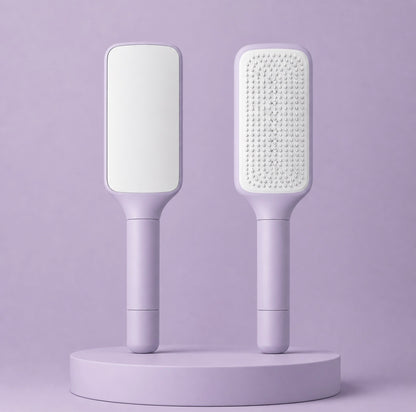 Brosse à cheveux auto-nettoyante violette Hairfy
