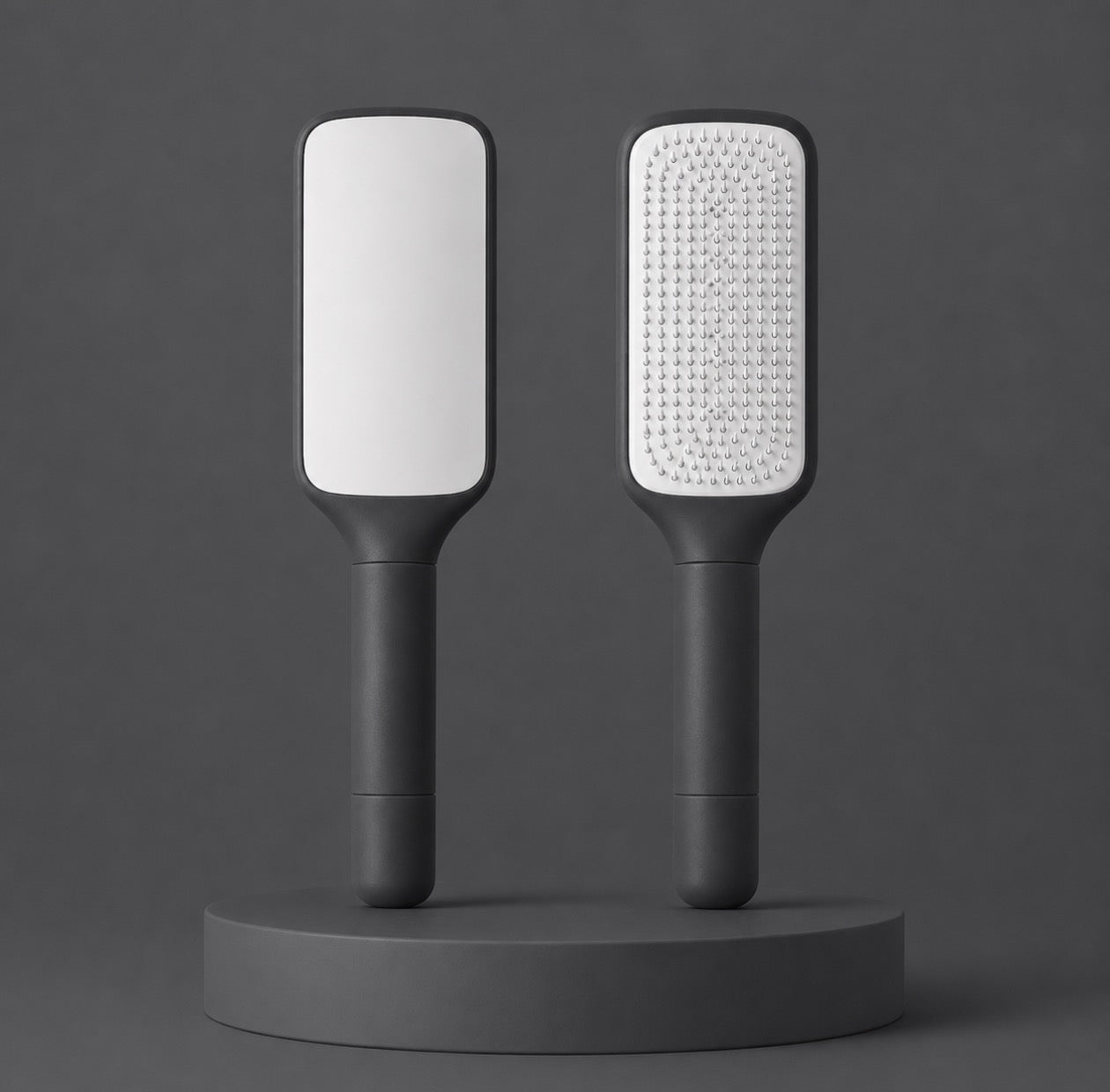 Brosse à cheveux auto-nettoyante Hairfy noire